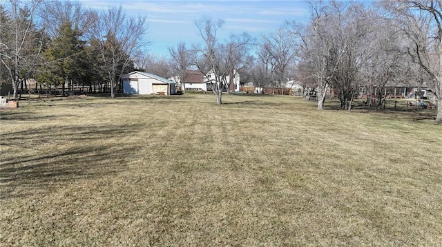 view of yard with an outdoor structure