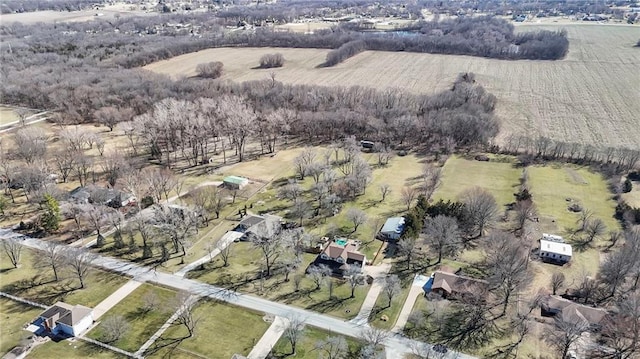 birds eye view of property featuring a rural view