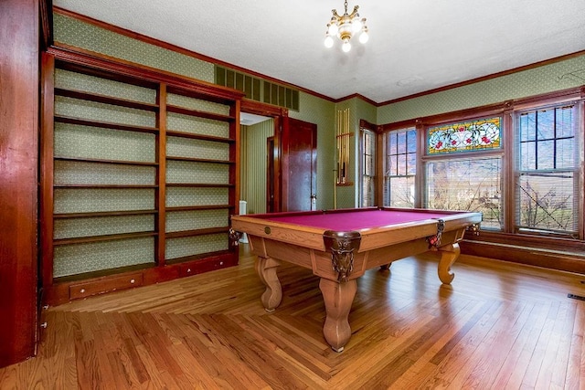 recreation room with wallpapered walls, billiards, crown molding, and wood finished floors