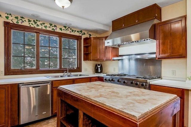 kitchen featuring a sink, under cabinet range hood, stainless steel dishwasher, and open shelves