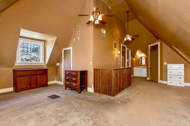 additional living space with high vaulted ceiling, carpet, and visible vents