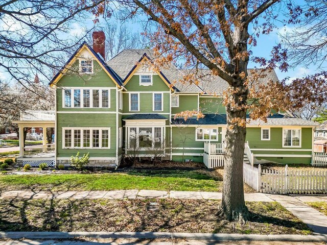 510 E Chippewa St, Paola, KS 66071 - view of front of house with a chimney