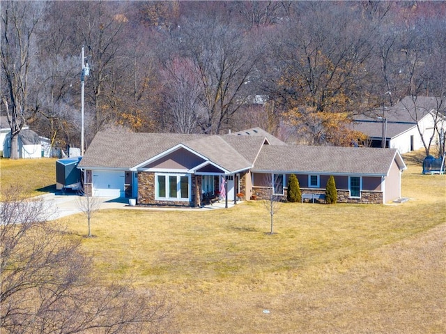 ranch-style house featuring an attached garage, stone siding, and a front yard