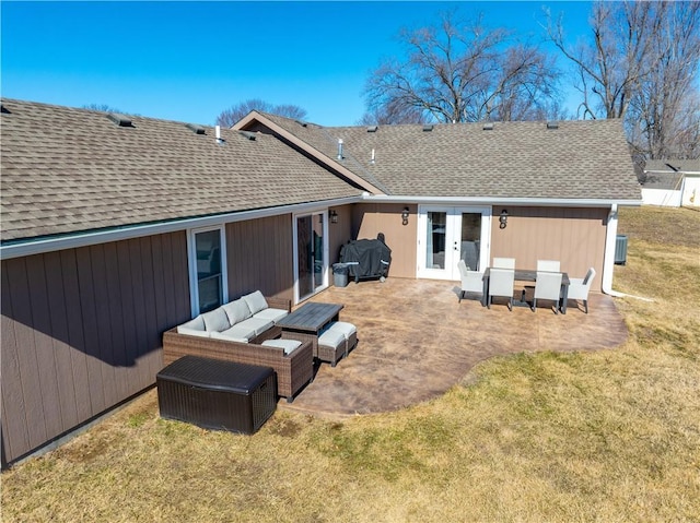 rear view of property featuring an outdoor hangout area, french doors, roof with shingles, a lawn, and a patio area