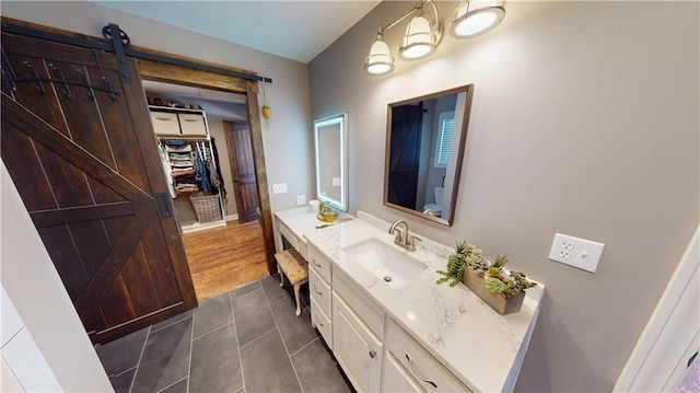 bathroom with tile patterned flooring and vanity