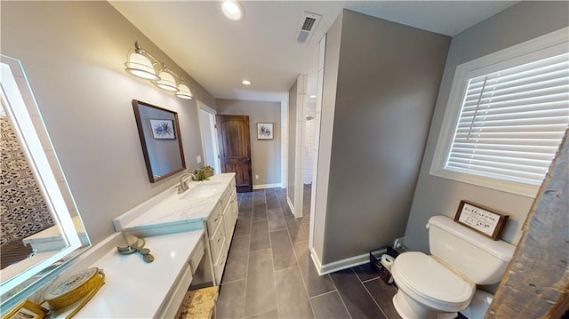 bathroom featuring a shower, recessed lighting, visible vents, toilet, and baseboards