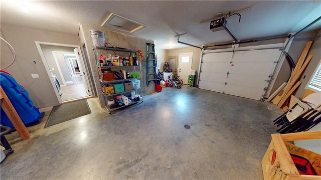 garage featuring a garage door opener