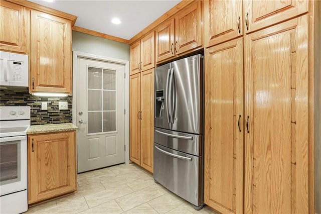 kitchen featuring light stone counters, decorative backsplash, white appliances, and crown molding