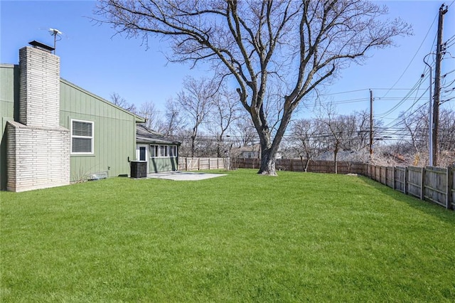 view of yard featuring a patio area and a fenced backyard