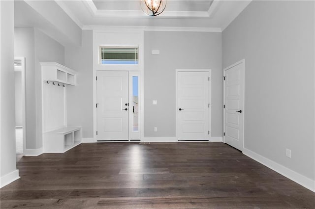 11019 N Bristol Ave, Kansas City, MO 64156 - entryway featuring an inviting chandelier, baseboards, a raised ceiling, and wood finished floors