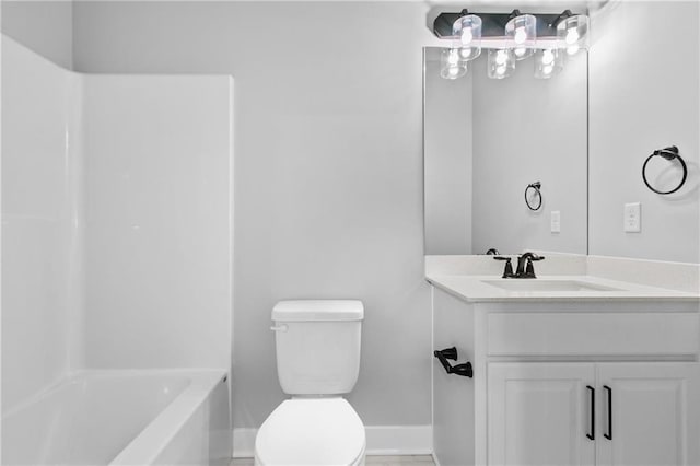 11019 N Bristol Ave, Kansas City, MO 64156 - bathroom featuring washtub / shower combination, vanity, toilet, and baseboards