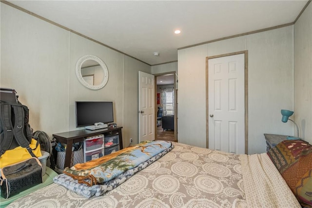 bedroom with ornamental molding