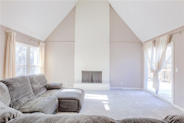 carpeted living room with high vaulted ceiling, a fireplace, and baseboards