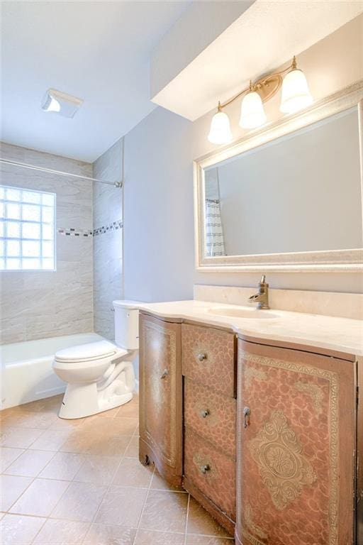 full bath featuring toilet, tile patterned flooring, and vanity