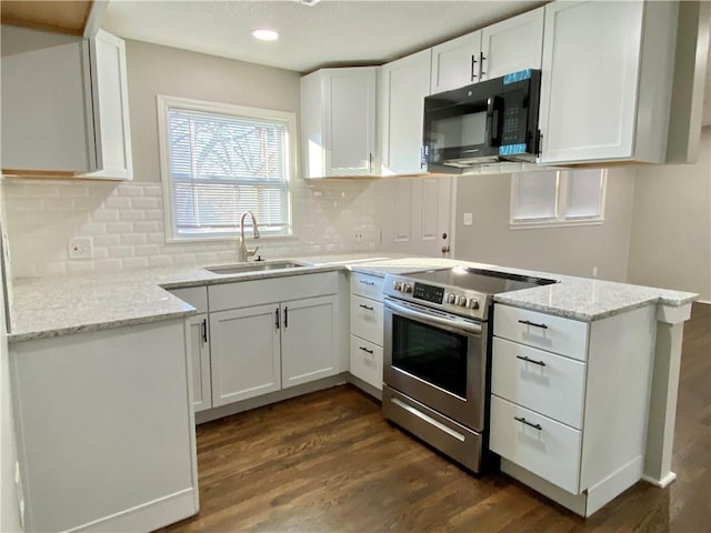 kitchen featuring stainless steel electric stove, dark wood-type flooring, white cabinets, a sink, and black microwave