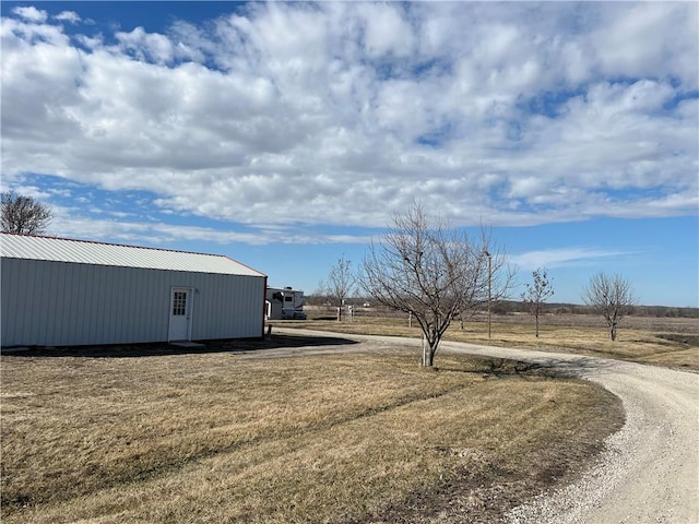 view of street with an outbuilding