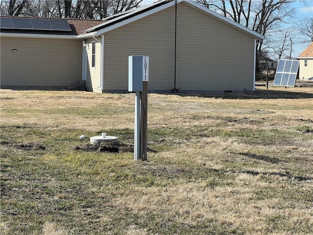 details featuring gutters, crawl space, and a downspout