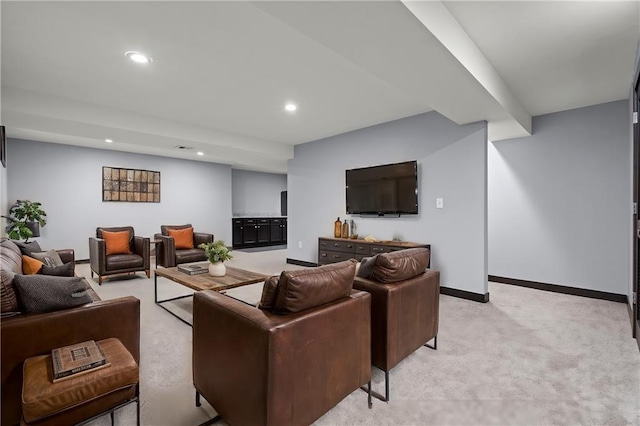 living area featuring recessed lighting, light colored carpet, and baseboards