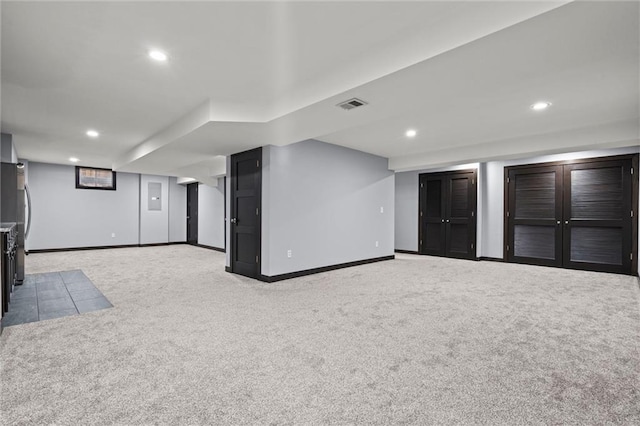 finished basement with recessed lighting, carpet, visible vents, and baseboards