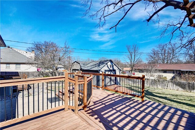 deck with a fenced backyard