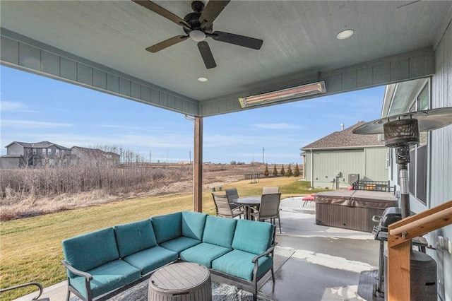 view of patio / terrace featuring outdoor dining area, outdoor lounge area, ceiling fan, and a hot tub