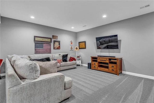 living area featuring carpet, visible vents, baseboards, and recessed lighting