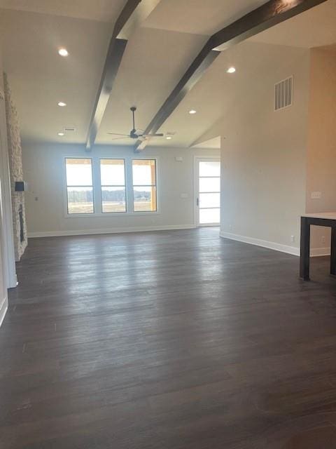 unfurnished living room featuring dark wood finished floors, visible vents, ceiling fan, and lofted ceiling with beams