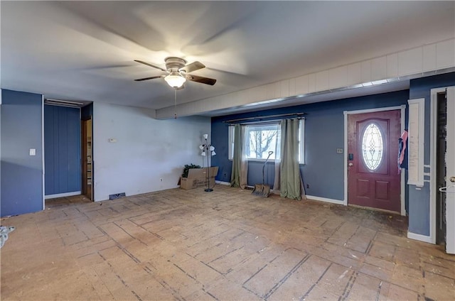 interior space featuring a ceiling fan and a healthy amount of sunlight