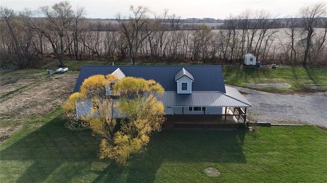 birds eye view of property with a rural view