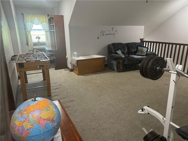 game room featuring carpet flooring and vaulted ceiling