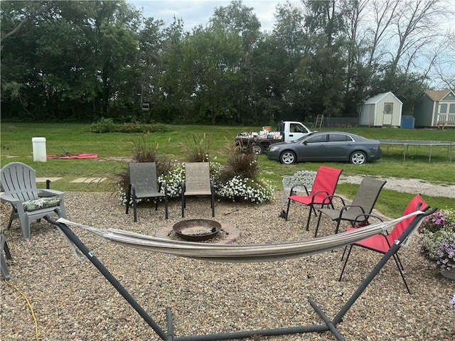 view of yard with a storage unit and an outdoor structure