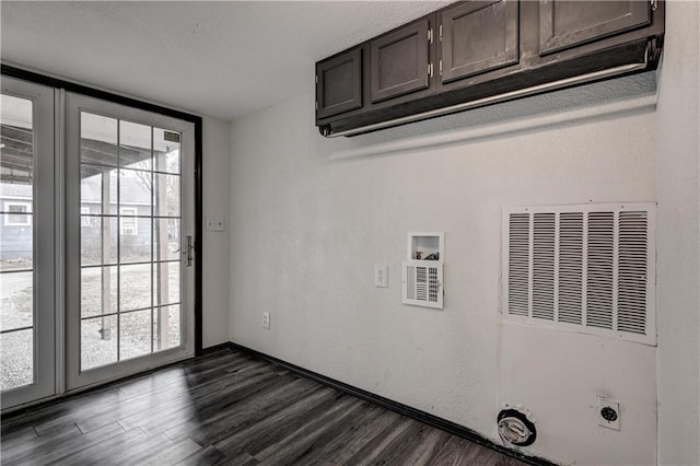 511 N E Ave, Columbus, KS 66725 - laundry area with electric dryer hookup, dark wood-type flooring, cabinet space, hookup for a washing machine, and a heating unit