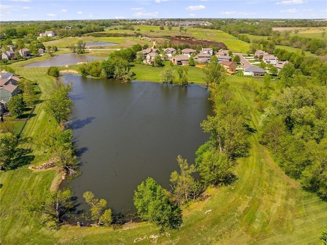 bird's eye view with a residential view and a water view