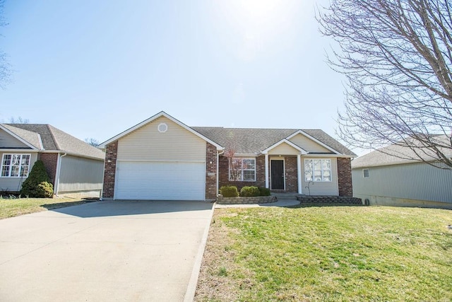 ranch-style home with brick siding, an attached garage, driveway, and a front lawn