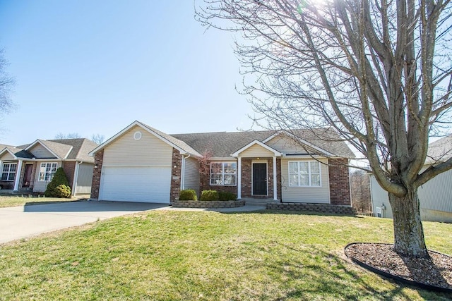 single story home with a front yard, an attached garage, brick siding, and driveway