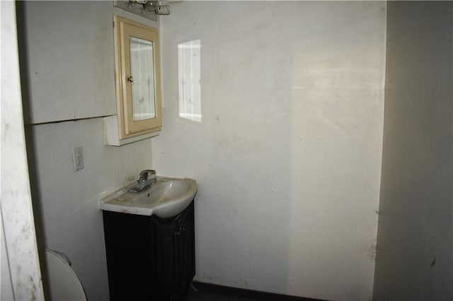 half bath with toilet and vanity