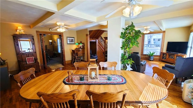 dining area featuring beamed ceiling, coffered ceiling, wood finished floors, baseboards, and stairs