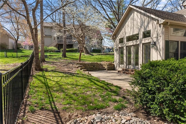 view of yard with fence