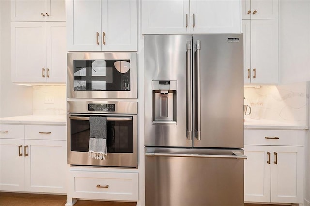 kitchen with white cabinets and stainless steel appliances