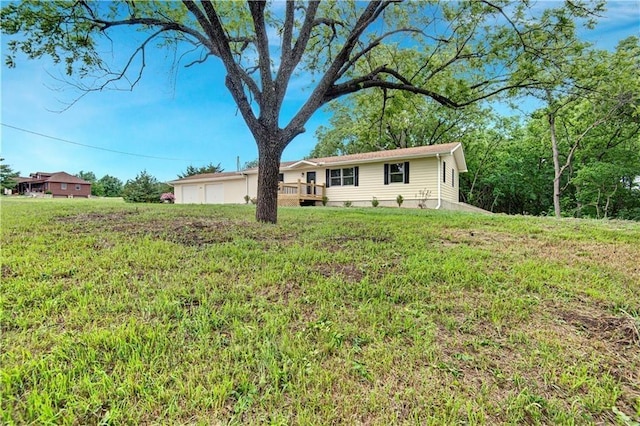 view of front of home with a front yard