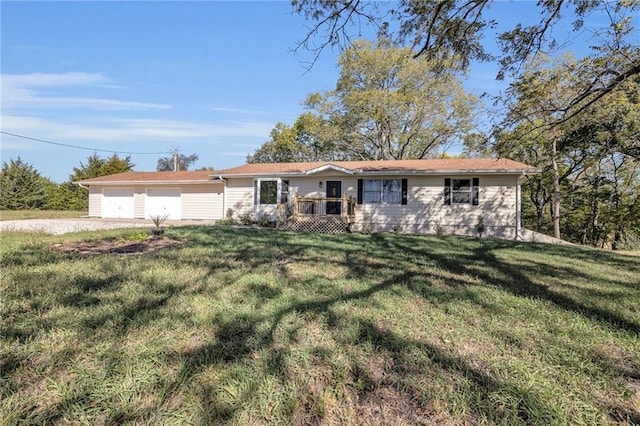 ranch-style home featuring a deck and a front yard