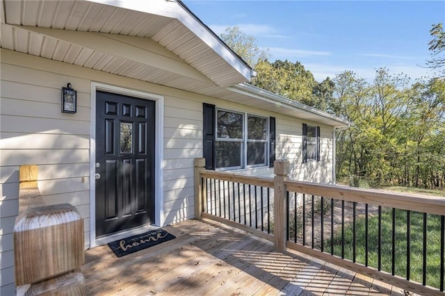 entrance to property featuring a deck