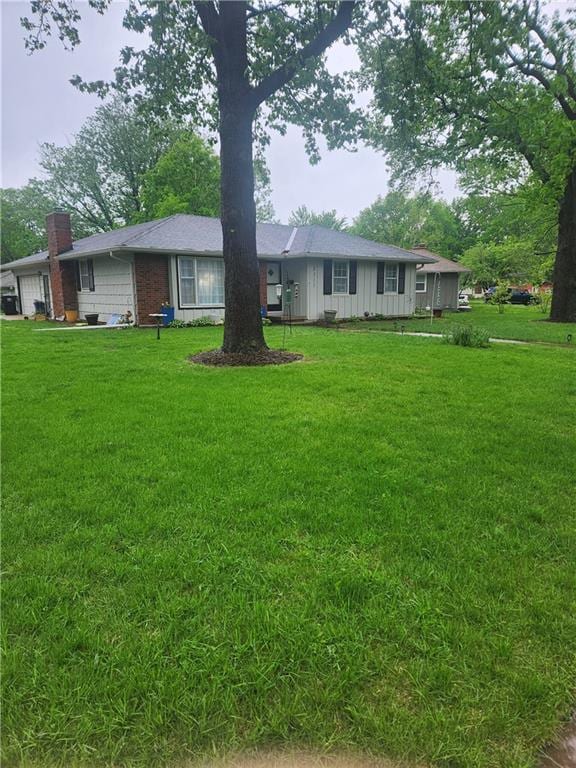 view of yard featuring an attached garage