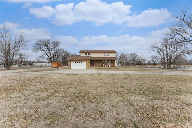 view of front of property with brick siding, covered porch, and a front yard