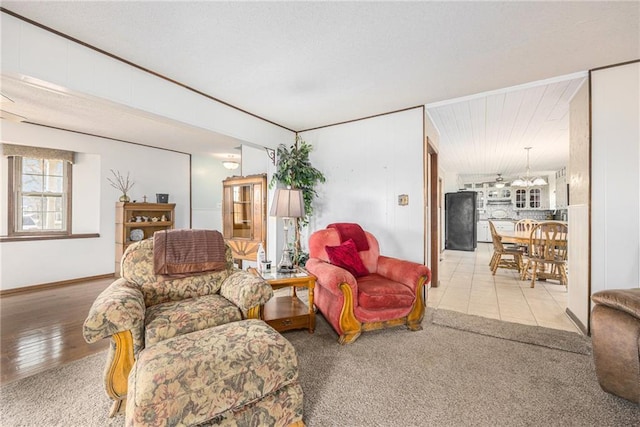 living room featuring a chandelier