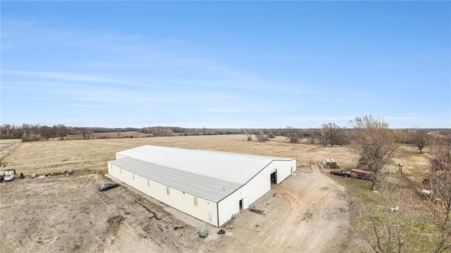 birds eye view of property with a rural view