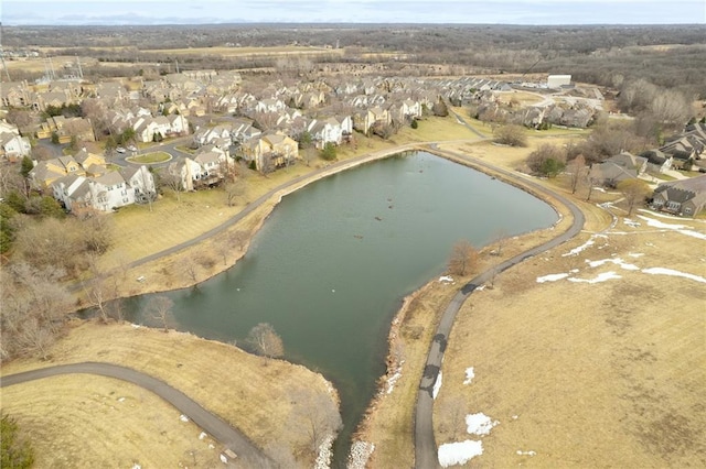 aerial view with a residential view and a water view