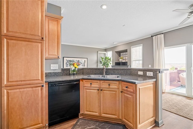 kitchen with black dishwasher, crown molding, a sink, a textured ceiling, and a peninsula