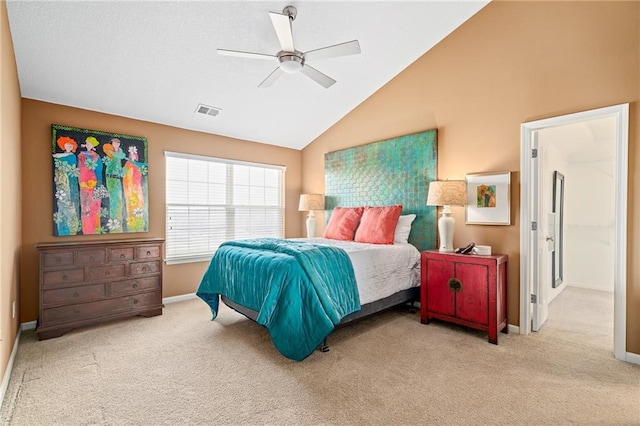 carpeted bedroom with a ceiling fan, visible vents, vaulted ceiling, and baseboards