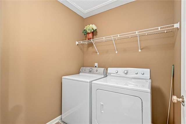 laundry area with laundry area and separate washer and dryer